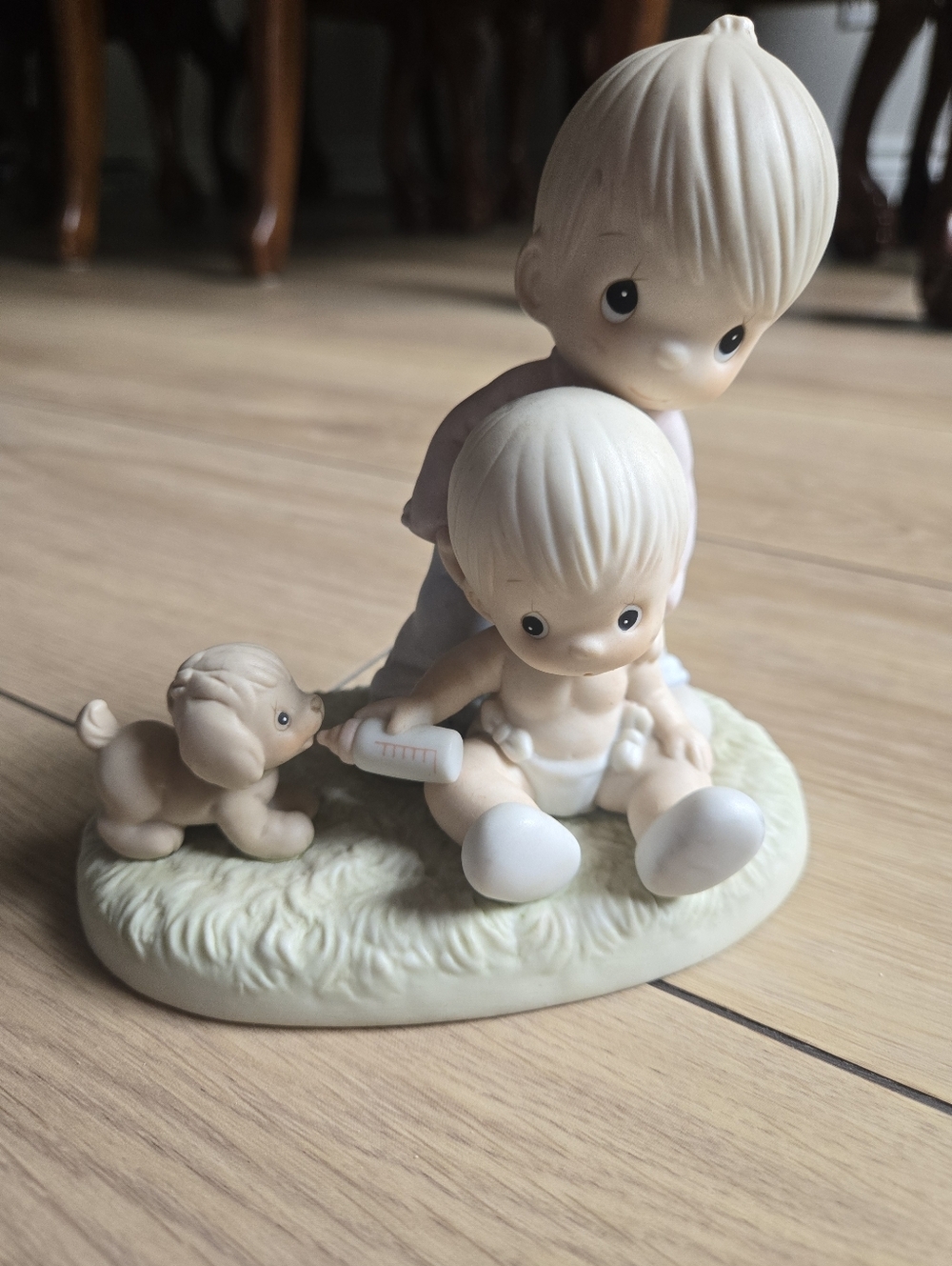 Precious Moments "Baby's First Pet" Figurine